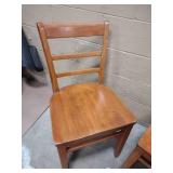 2 wooden straight chairs