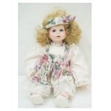 Vintage bisque porcelain collector doll 11" tall (sitting)