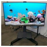 65" Samsung QB65R HDR 4K UHD (Ultra-High Def) Commercial Smart LED Display on Ergotron Neo-Flex Heavy-Duty Rolling TV Cart with Adjustable Shelf and Rotating TV Mount