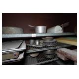 Industrial Rolling Shelf with Large Assortment of Cake and Bread Pans