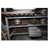 Industrial Rolling Shelf with Large Assortment of Cake and Bread Pans