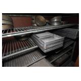 Industrial Rolling Shelf with Large Assortment of Cake and Bread Pans