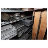 Industrial Rolling Shelf with Large Assortment of Cake and Bread Pans