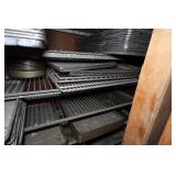 Industrial Rolling Shelf with Large Assortment of Cake and Bread Pans