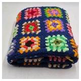 Vintage Crocheted Granny Square Afghan – Multicolor Floral Motifs on Navy Ground