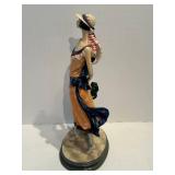 Porcelain Figurine - Tall Art Deco Woman in Orange Dress & Blue Sash with Striped Hat