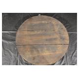 Round Religious Plaque - Brown-Robed Figure Holding Child