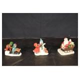 Holiday Figurines Trio - Santa Sleigh, Snowman with Scarf, Sledding Kids