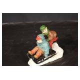 Holiday Figurines Trio - Santa Sleigh, Snowman with Scarf, Sledding Kids