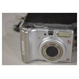 Canon PowerShot Silver Digital Camera & Canon PowerShot Blue Digital Camera & Kodak EasyShare CX7300