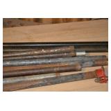 Steel Pipes & Rods - Assorted Workshop Hardware with Red Clamps