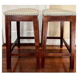 O - Pair of Saddle Stools with Nailhead Trim