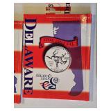 Delaware and New Jersey Quarters with Books