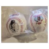 Lot of 2 Baseballs Featuring Brad Radke and Kirby Puckett