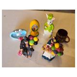Ceramic Figurines and Decorative Items including Balloon Vendor Figures, Rabbit, and Easter Egg
