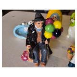 Ceramic Figurines and Decorative Items including Balloon Vendor Figures, Rabbit, and Easter Egg