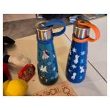 Disney Themed Toys and Accessories including Frozen Artwork, Mickey Mouse Plush Toys, and Water Bottles