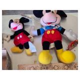 Disney Themed Toys and Accessories including Frozen Artwork, Mickey Mouse Plush Toys, and Water Bottles