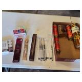 Incense, Candles, and Empty Tins