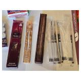 Incense, Candles, and Empty Tins