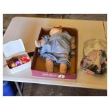 Cabbage Patch Doll, Small Dolls, and Bag of Clothes