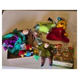 Assorted plush toys and dolls including Pound Puppies, Angry Birds, and more