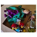 Assorted plush toys and dolls including Pound Puppies, Angry Birds, and more