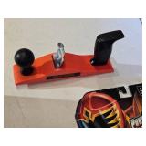 Box of Toy Cars and Power Rangers Items including Black & Decker Toy Plane, Beyblade Slingshot, Power Rangers Mystic Cycle Blasters, and Matchbox Cars