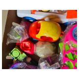 Lot of Toys including The Jetsons Puzzle Ornaments, Fisher Price Vehicle, and Assorted Toy Figures