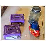 Toy Cash Boxes and Coin Banks including Purple Cash Boxes, Bear Bank, and Plastic Jug Bank