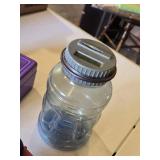 Toy Cash Boxes and Coin Banks including Purple Cash Boxes, Bear Bank, and Plastic Jug Bank