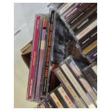 Box of Music CDs including Mariah Carey, TLC, En Vogue, and Lenny Kravitz, among others