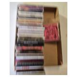 Ernie Ball Super Slinky Guitar Strings and Music CD Collection featuring artists like Kenny G, Andrea Bocelli, and Santana.