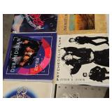 Lot of Vinyl Records Featuring Beatles Greatest, Bee Gees, Duran Duran, Madonna, and More