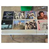 Lot of Vinyl Records including Gap Band VI, Full Force, Ready for the World, Julio Iglesias, Sade, Kurtis Blow, The Deele, and Commodores