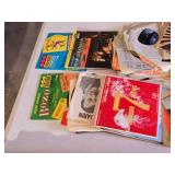 Collection of Vintage Vinyl Records and Sleeves including titles like "Number 7 Theme" by Mitchell Ayres and "Hawaii Calls." The lot also contains empty record sleeves featuring various artists and th