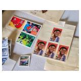 Collection of Vintage and Modern U.S. Postage Stamps Some Unmarked, Pile of Used