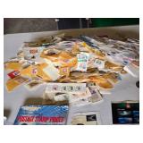 Collection of Vintage and Modern U.S. Postage Stamps Some Unmarked, Pile of Used
