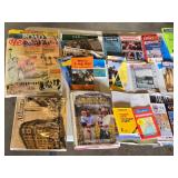 Collection of Maps and Travel Guides Including AAA Road Atlases and Oslo Travel Guides Assortment of travel-related books and maps featuring various destinations including Wales, Louisiana, and Scandi