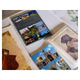 Collection of Assorted Prints and Artwork Including Dog Portraits, Scenic Landscapes, and Floral Designs