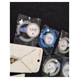 Lokai Bracelets, Emoji Necklace, Sterling Silver Earrings, and Unicorn Necklaces