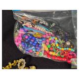 Lot of Jewelry and Craft Supplies including Beads, Bracelets, and Earrings