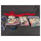 Assorted Jewelry and Beads Lot including Necklaces, Bracelets, and Loose Beads