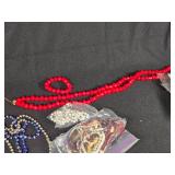 Assorted Jewelry and Beads Lot including Necklaces, Bracelets, and Loose Beads