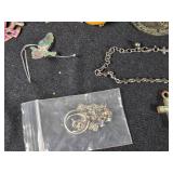 Lot of Jewelry and Accessories including Cross Pendants, Rosaries, and Earrings