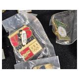 Lot of Assorted Brooches and Pins featuring themes like Operation Desert Storm, sports teams, and novelty designs.