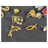 Lot of Assorted Brooches and Pins featuring themes like Operation Desert Storm, sports teams, and novelty designs.