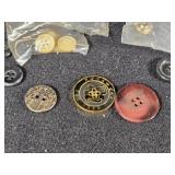 Assorted Buttons and Sewing Supplies including Black Button Collection, Decorative Buttons, and Miscellaneous Sewing Items
