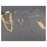 Lot of Jewelry Pieces Including Gold Tone Chains and Beaded Necklaces