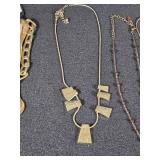 Lot of Jewelry Pieces Including Gold Tone Chains and Beaded Necklaces